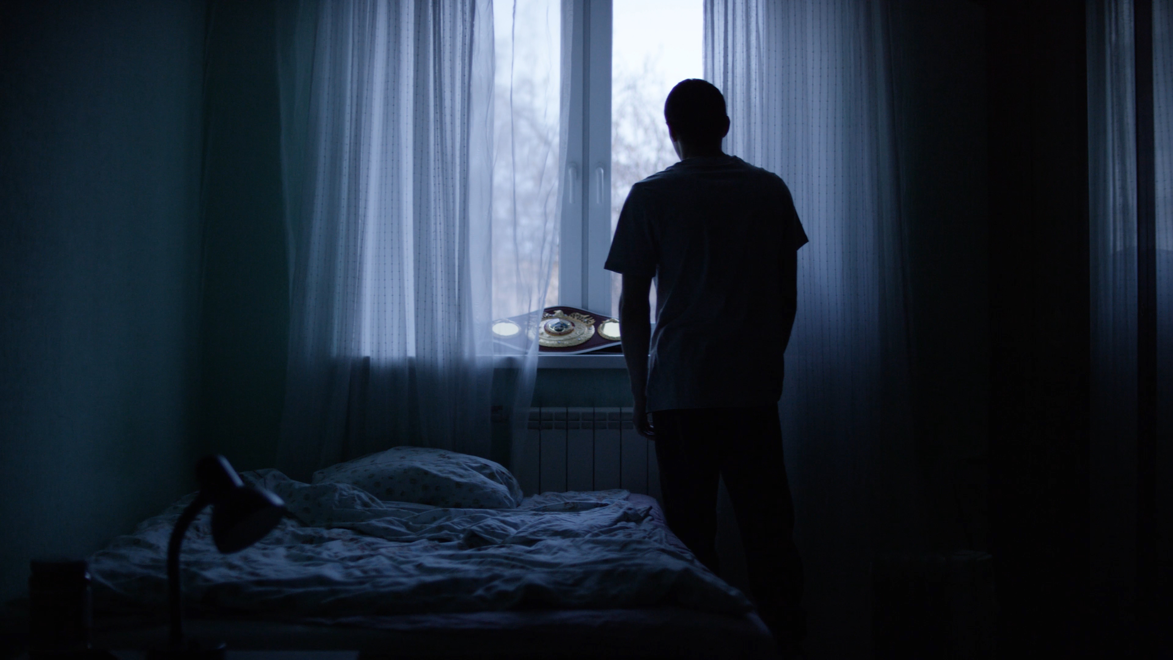 Silhouette of a man in a room | Source: Shutterstock