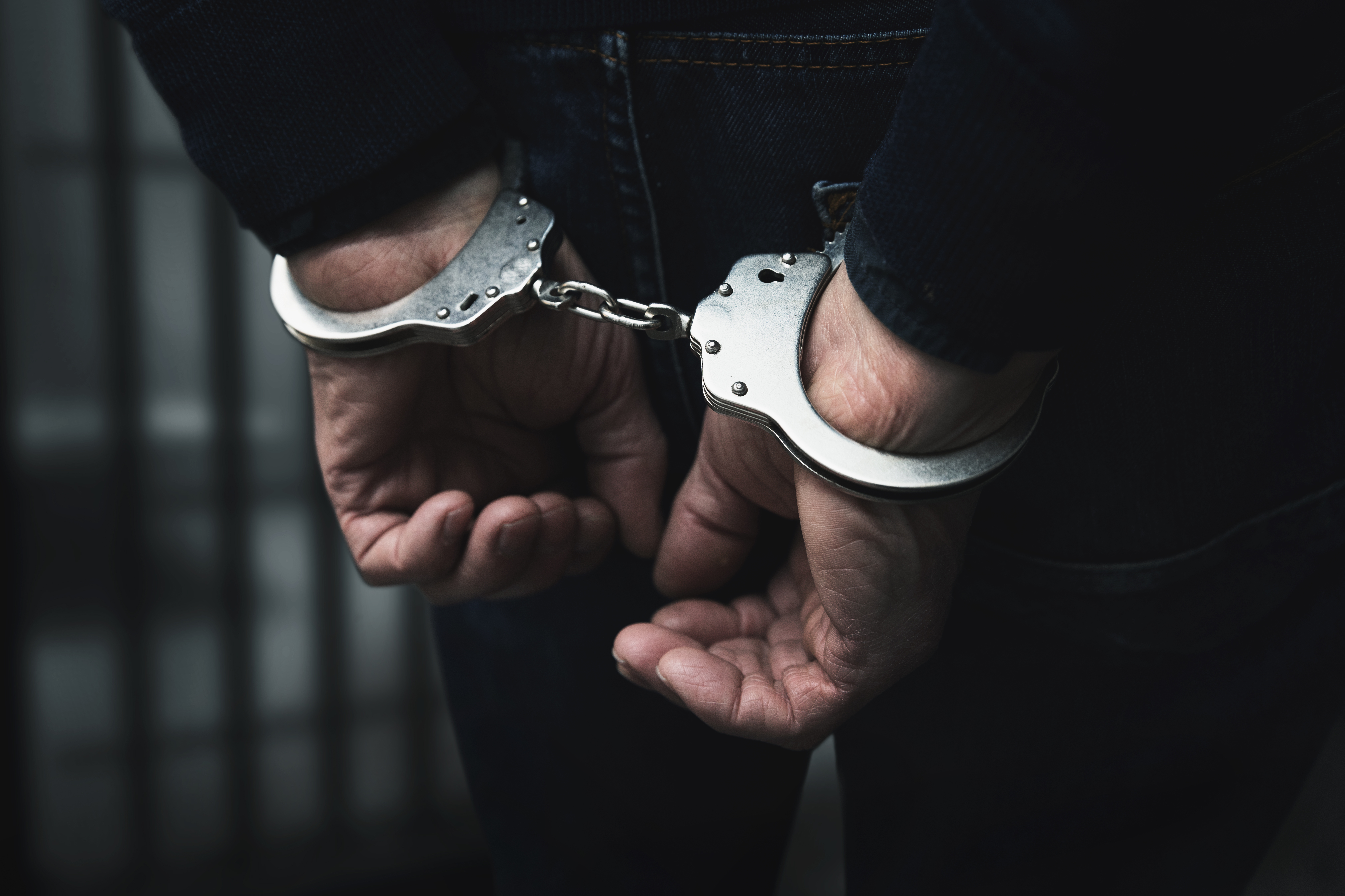 Man in hadcuffs | Source: Shutterstock
