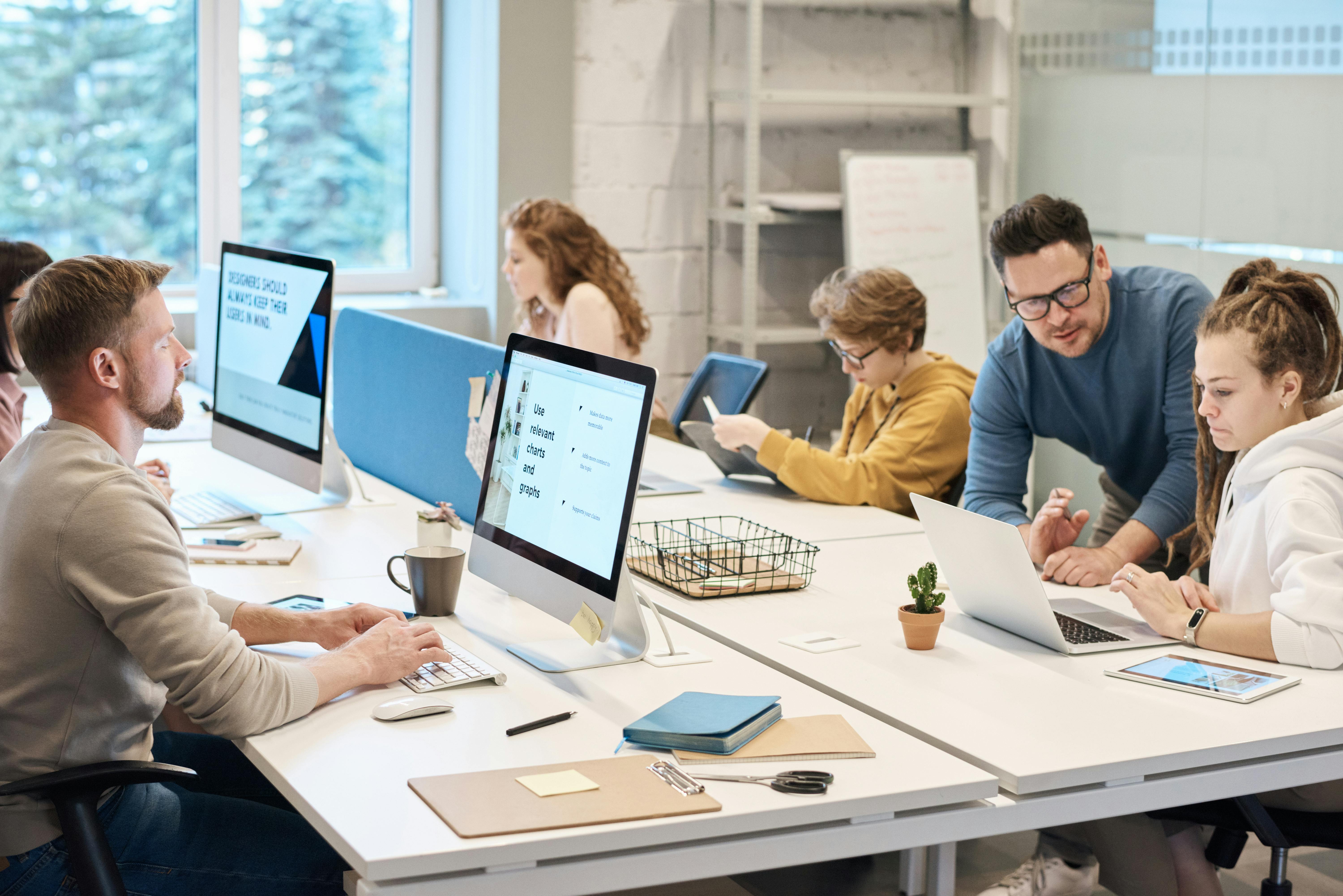 People working in an office | Source: Pexels