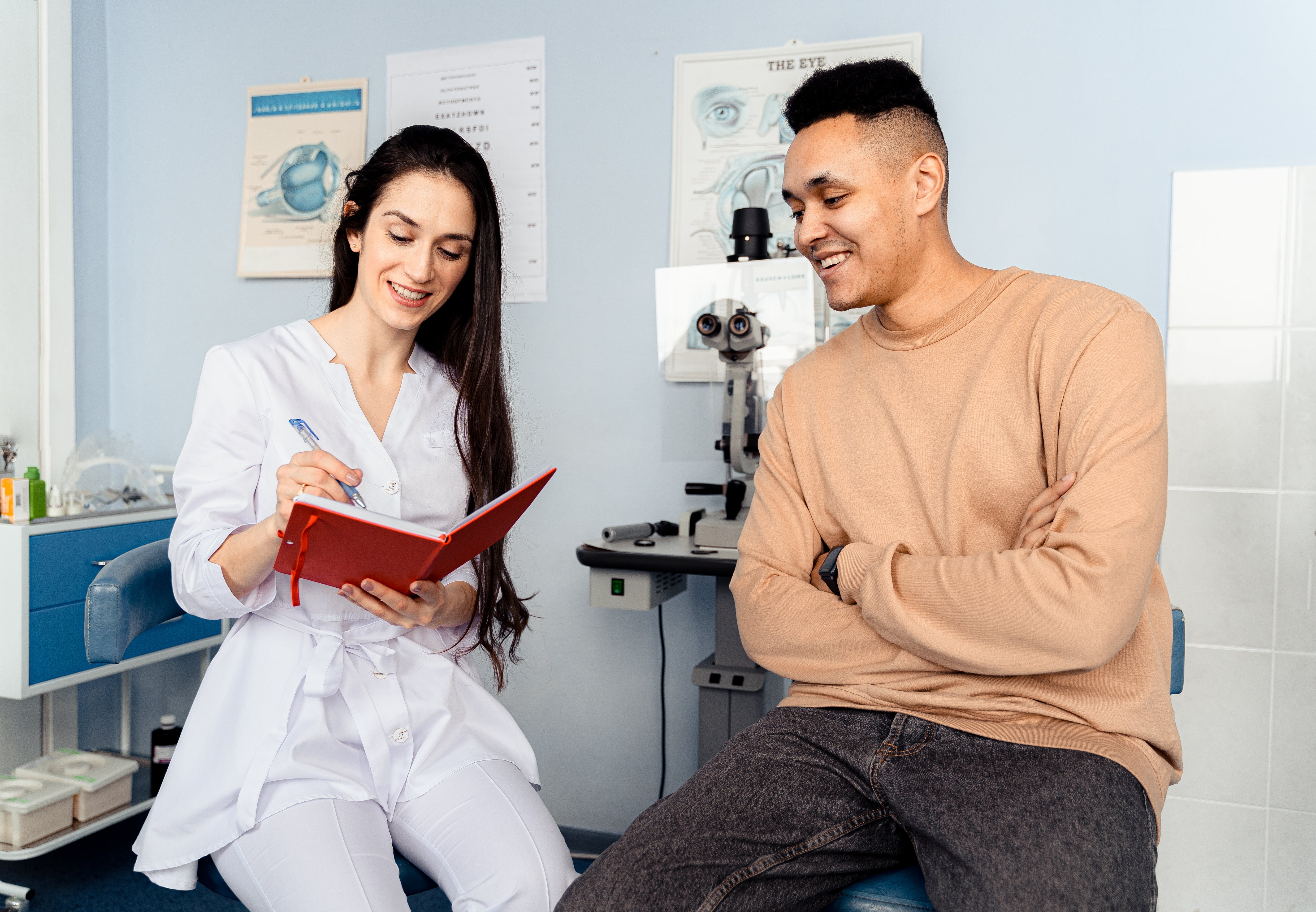 Doctor talking to a patient. | Source: Pexels