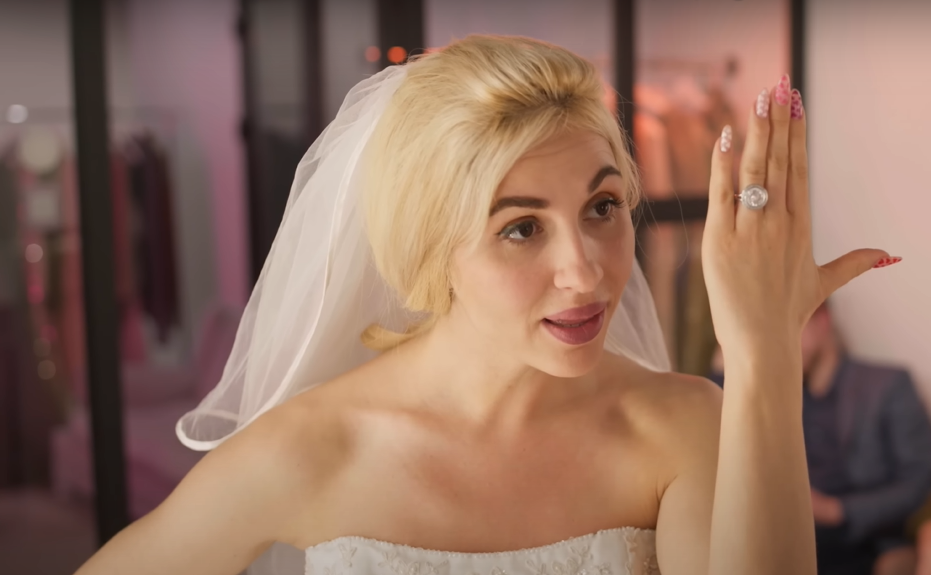 Bride flaunting her engagement ring | Source: YouTube / DramatizeMe