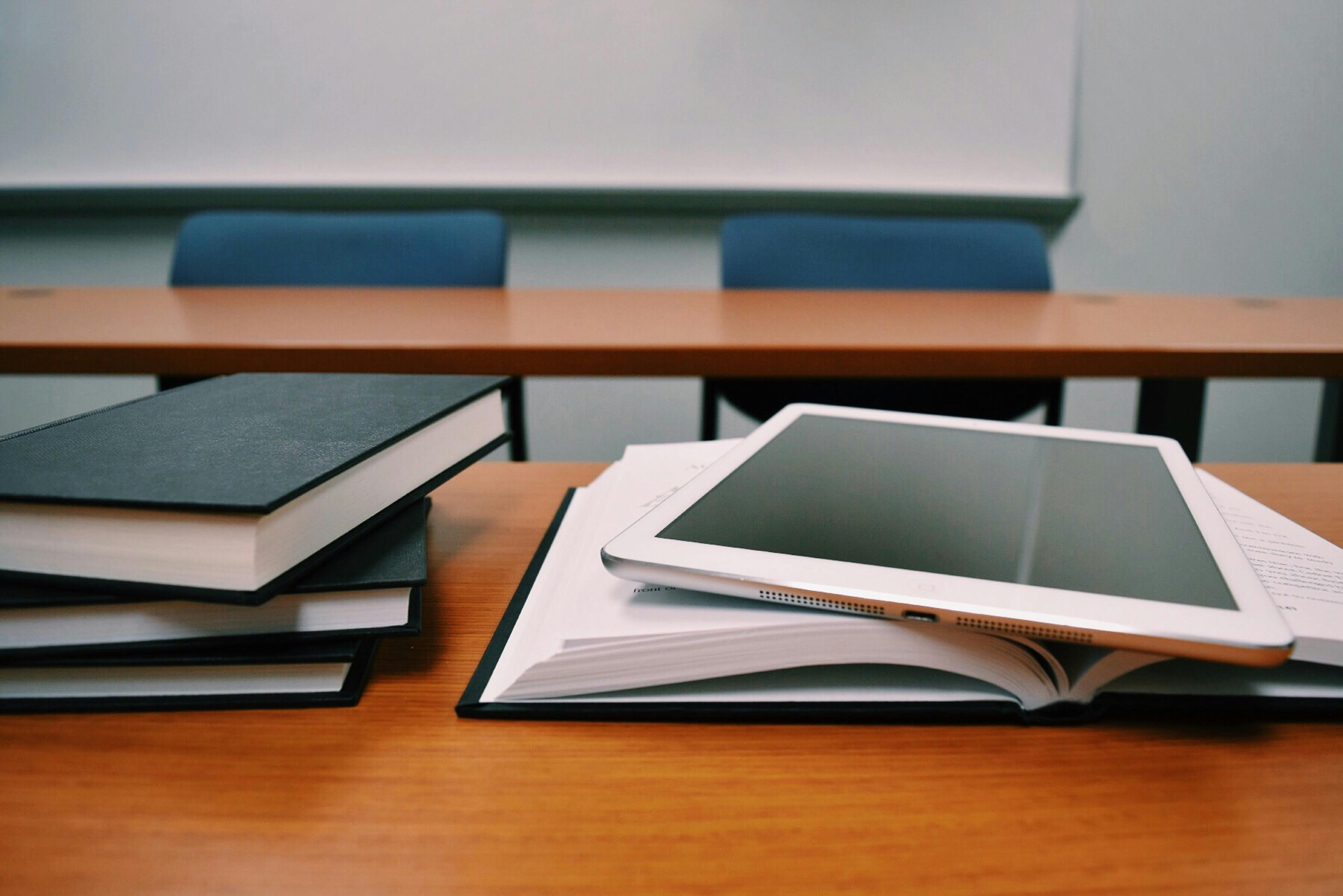 Silver Ipad on a white paper page | Source: Pexels