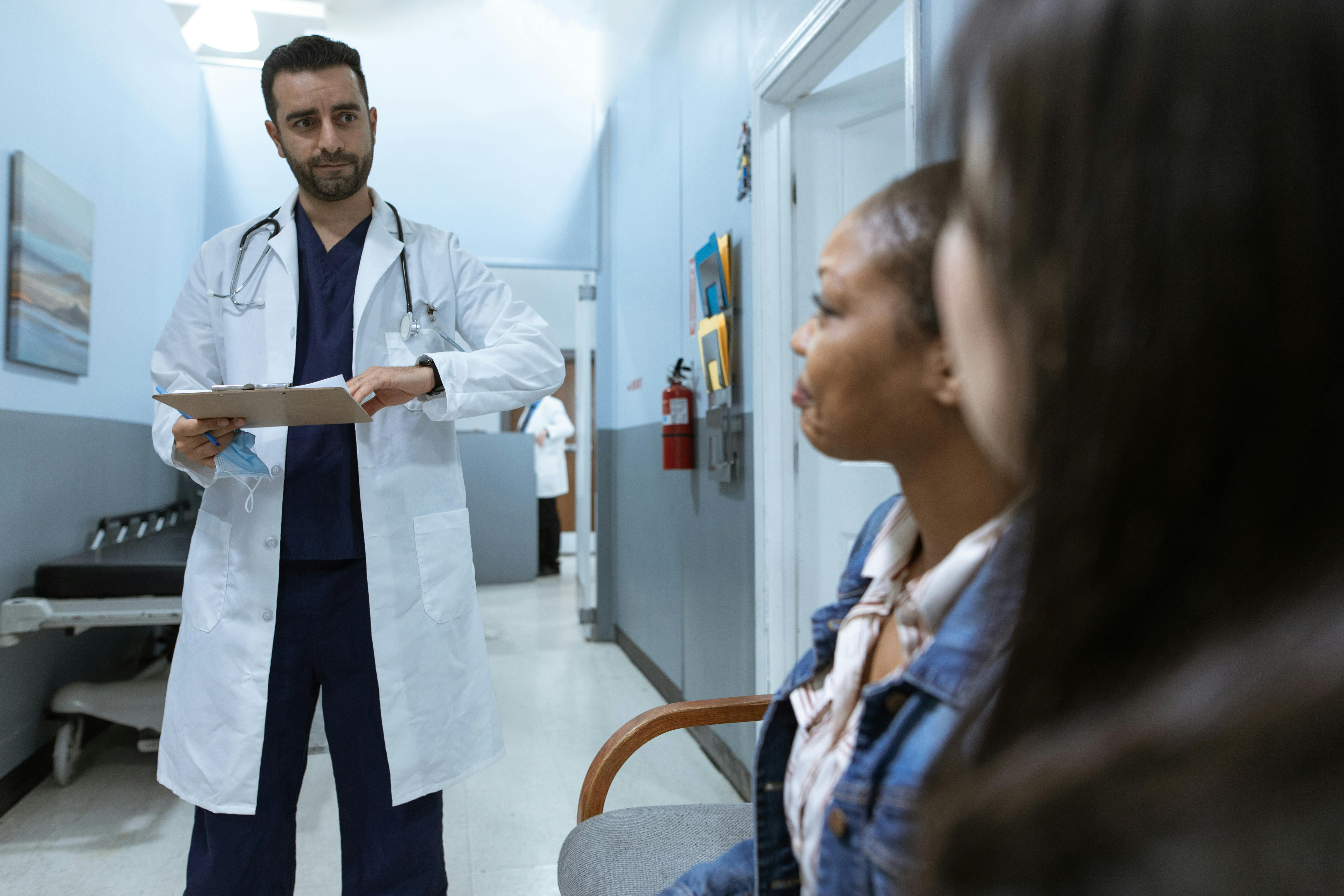 Doctor and two patients | Source: Pexels