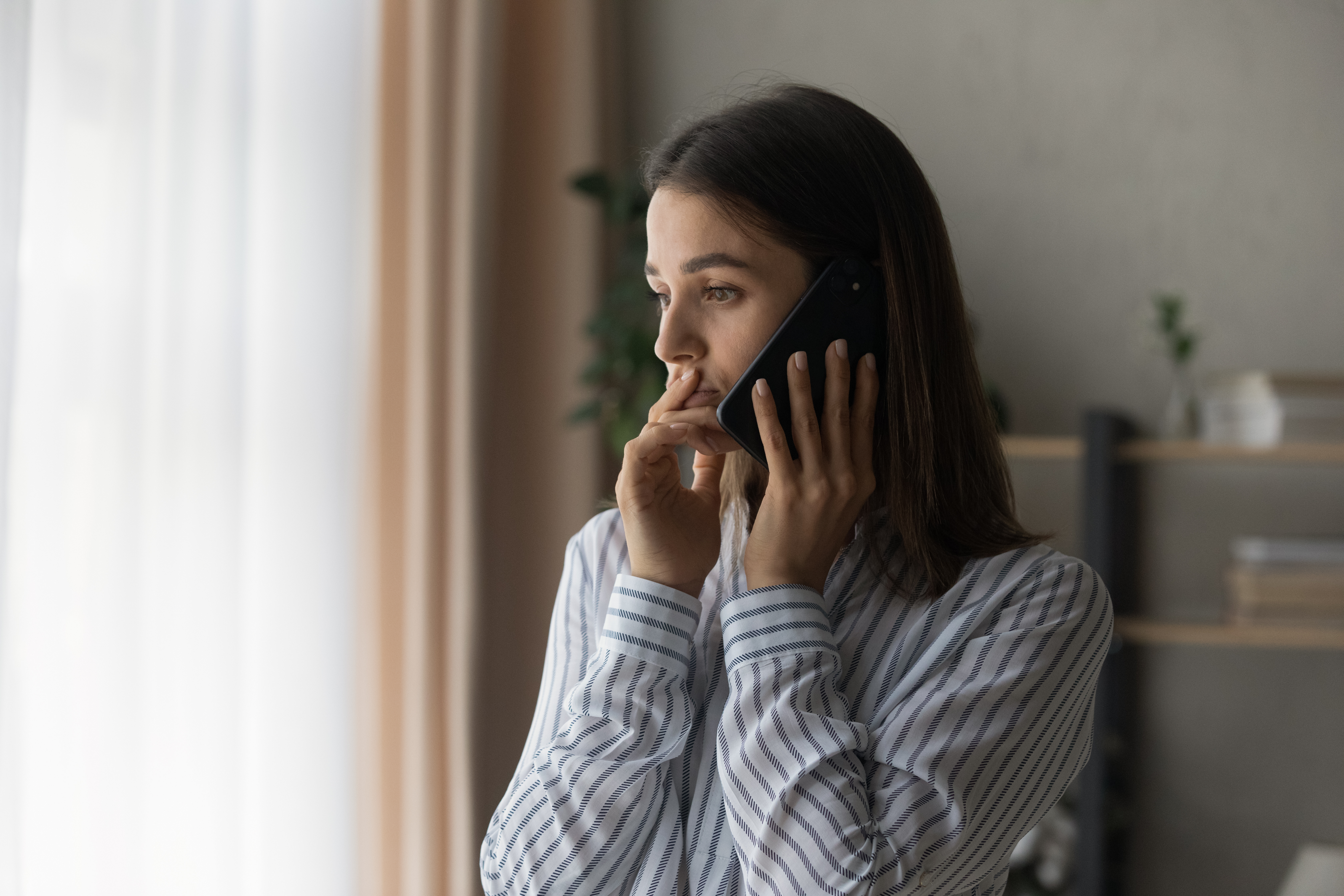 Woman on phone | Source: Shutterstock