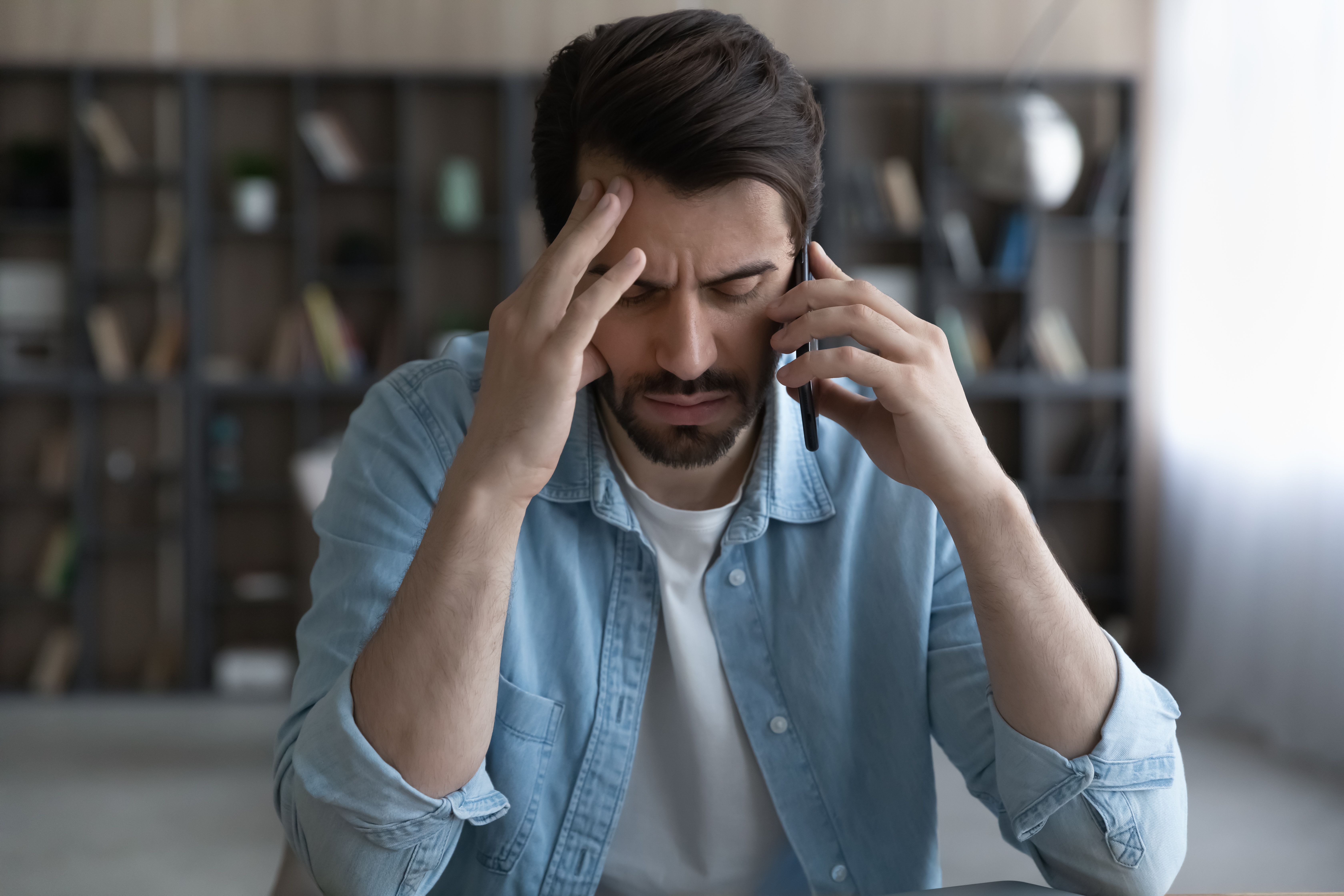 Stressed young man | Source: Shutterstock