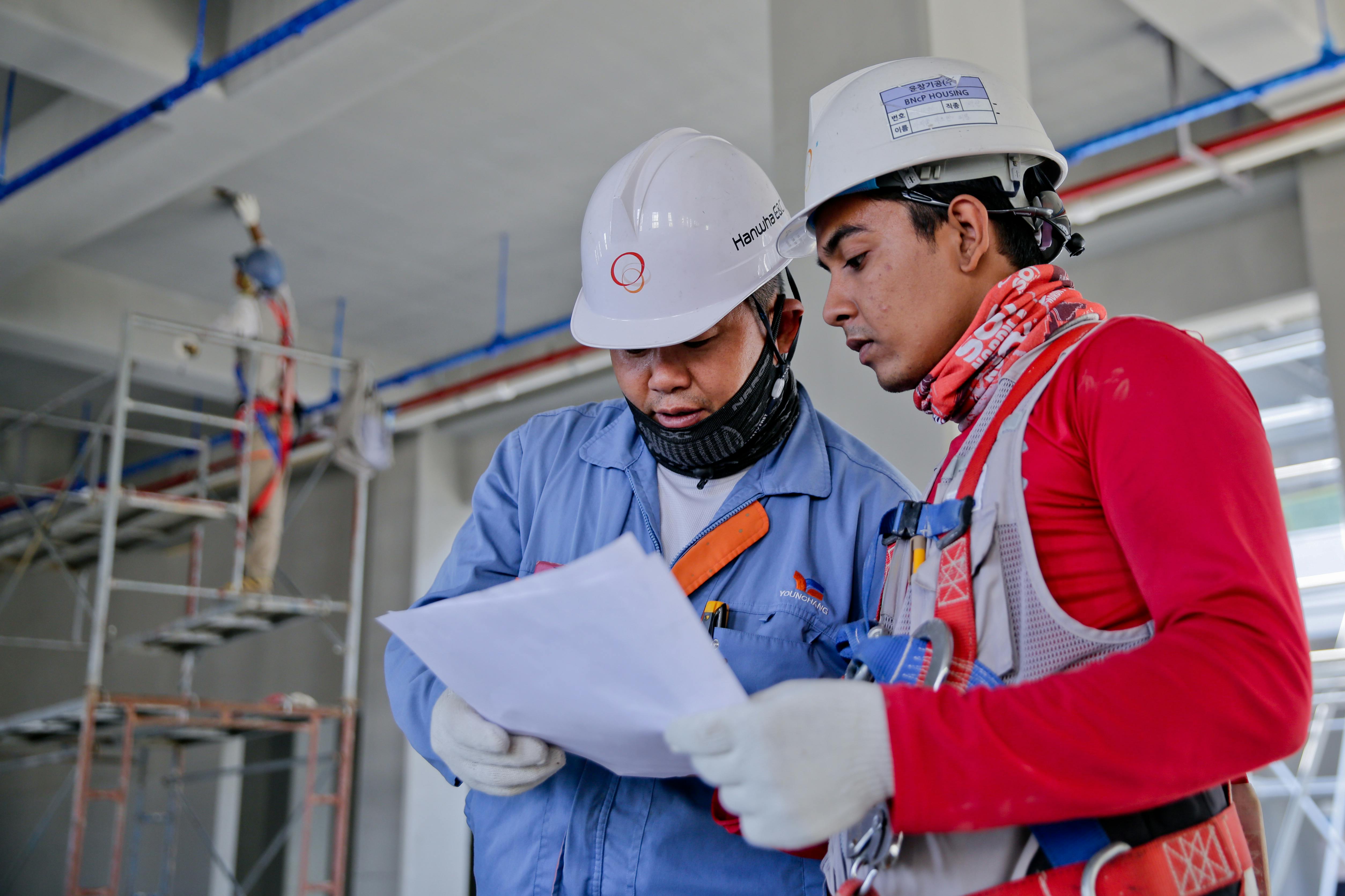 Men working | Source: Pexels