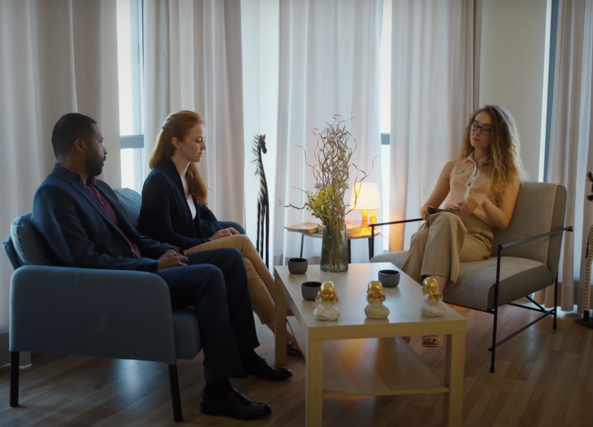 Man and his wife at a session with a therapist | Source: YouTube / DramatizeMe